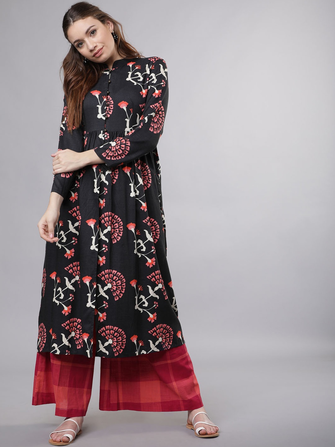 Vishudh Women Black & Orange Printed Kurta with Palazzos