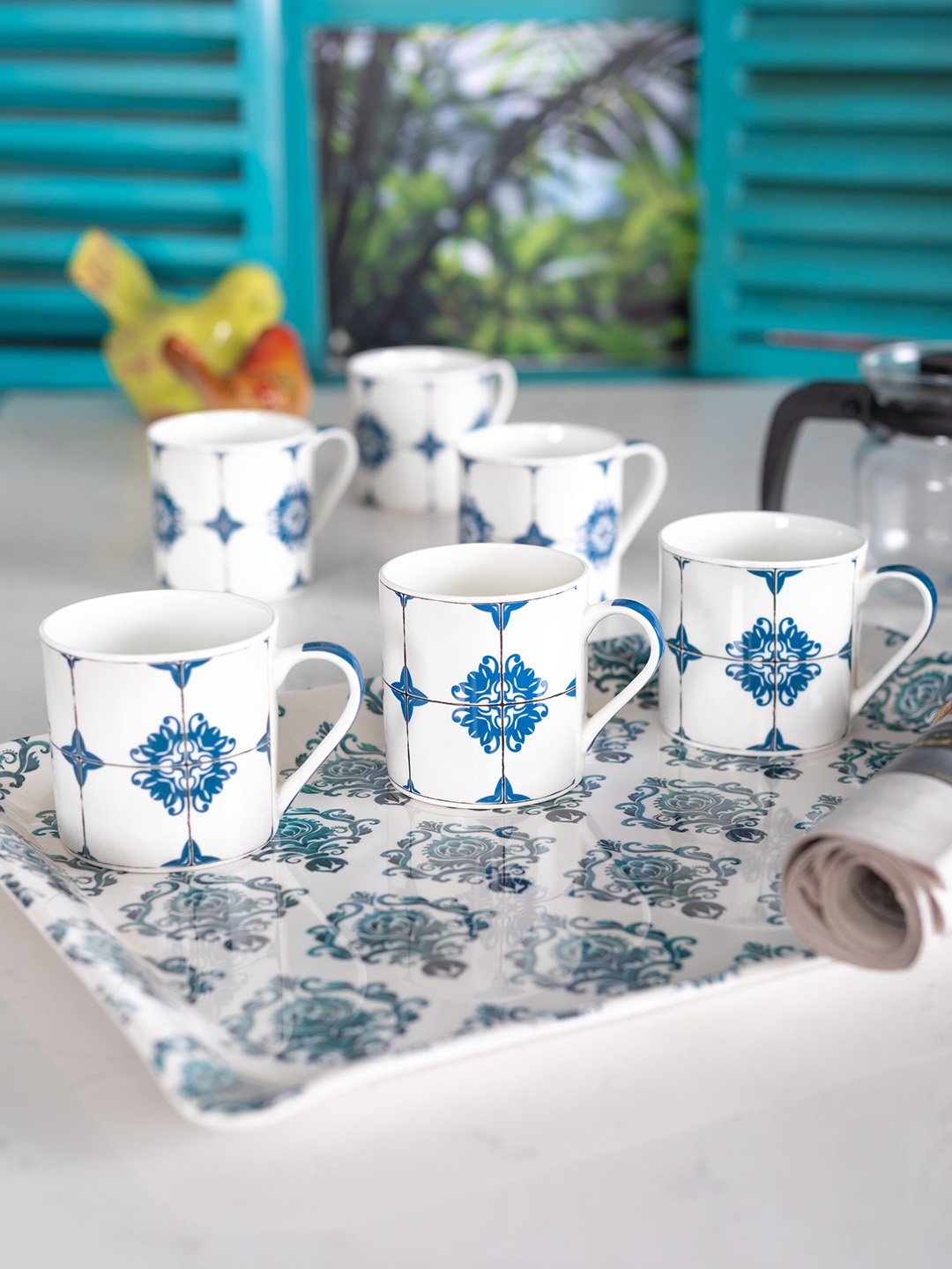GOODHOMES Set of 6 White & Teal Blue Printed Tea Coffee Mugs with Co-ordinating Melamine Tray
GOODHOMES Set of 6 White & Teal Blue Printed Tea Coffee Mugs with Co-ordinating Melamine Tray