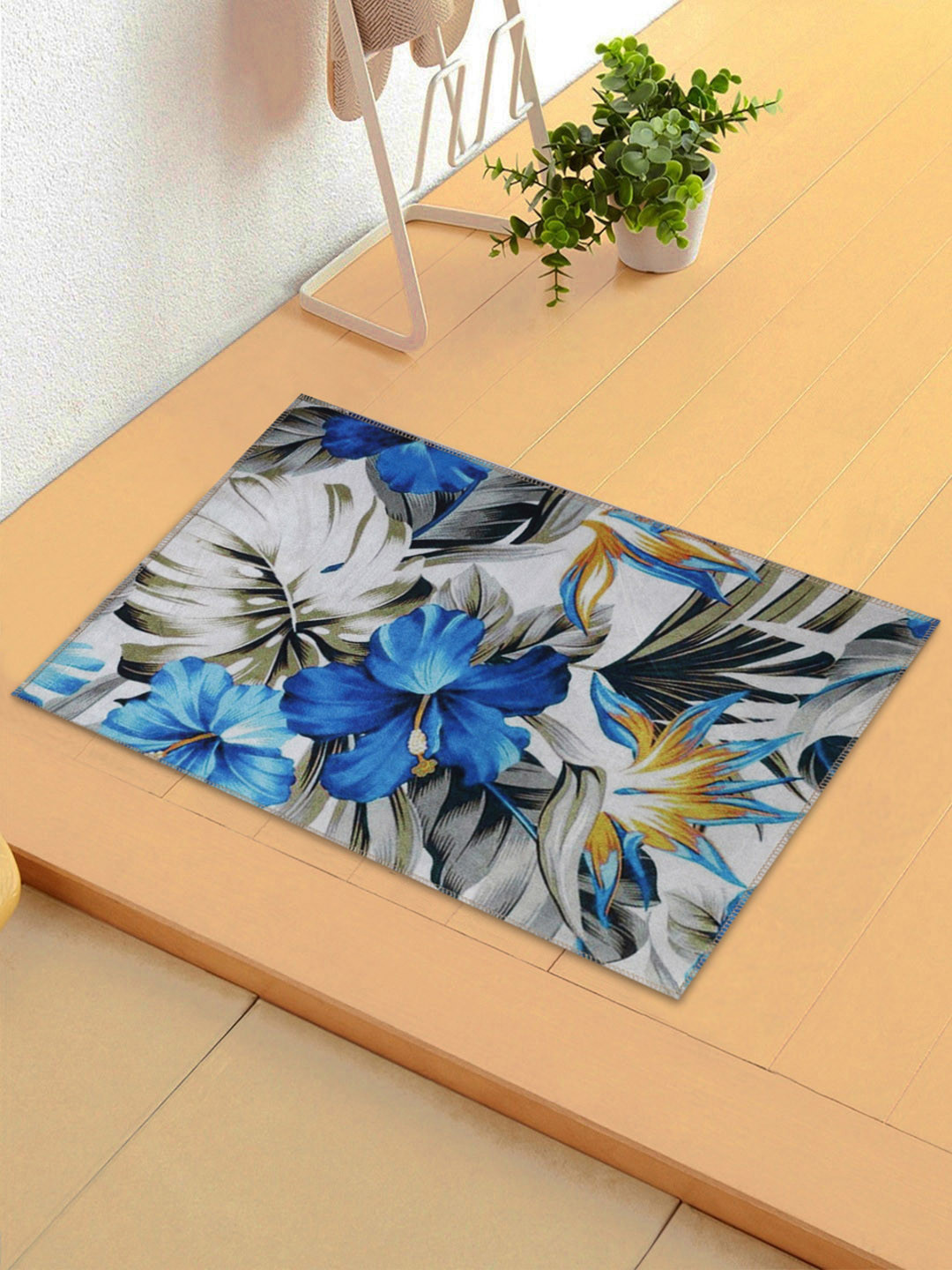 ROMEE White & Blue Printed Anti-Skid Doormat
ROMEE White & Blue Printed Anti-Skid Doormat