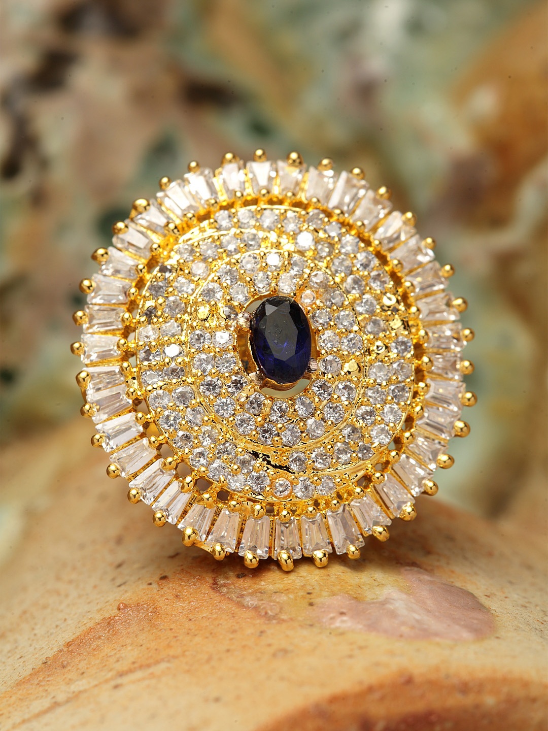 Bhana Fashion Gold-Plated White & Blue American Diamond Stone Studded Handcrafted Circular Finger Ring
Bhana Fashion Gold-Plated White & Blue American Diamond Stone Studded Handcrafted Circular Finger Ring