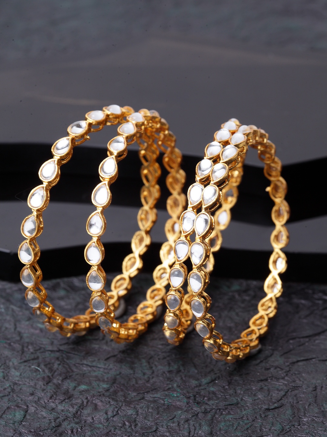 Shining Diva Set Of 4 Gold-Plated & White Kundan-Studded Antique Bangles