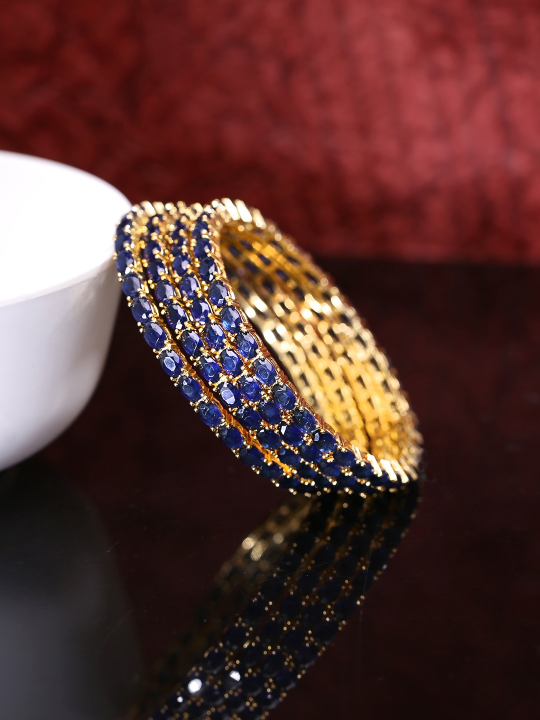 Yellow Chimes Set Of 4 Gold-Plated Blue AD-Studded Handcrafted Bangles