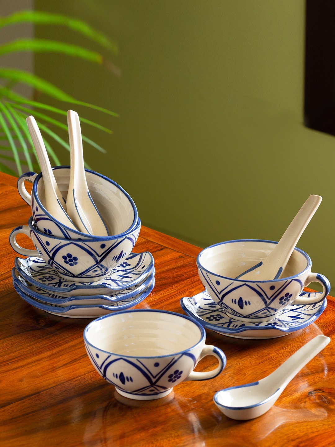ExclusiveLane White & Blue Set of 4 Hand-Painted Ceramic Bowls With Spoons & Saucer Plates
ExclusiveLane White & Blue Set of 4 Hand-Painted Ceramic Bowls With Spoons & Saucer Plates