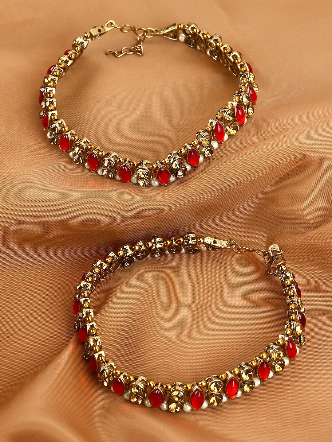 ANIKAS CREATION Set Of 2 Gold-Plated Red & Beige Kundan-Studded Beaded Vilandi Anklets
ANIKAS CREATION Set Of 2 Gold-Plated Red & Beige Kundan-Studded Beaded Vilandi Anklets