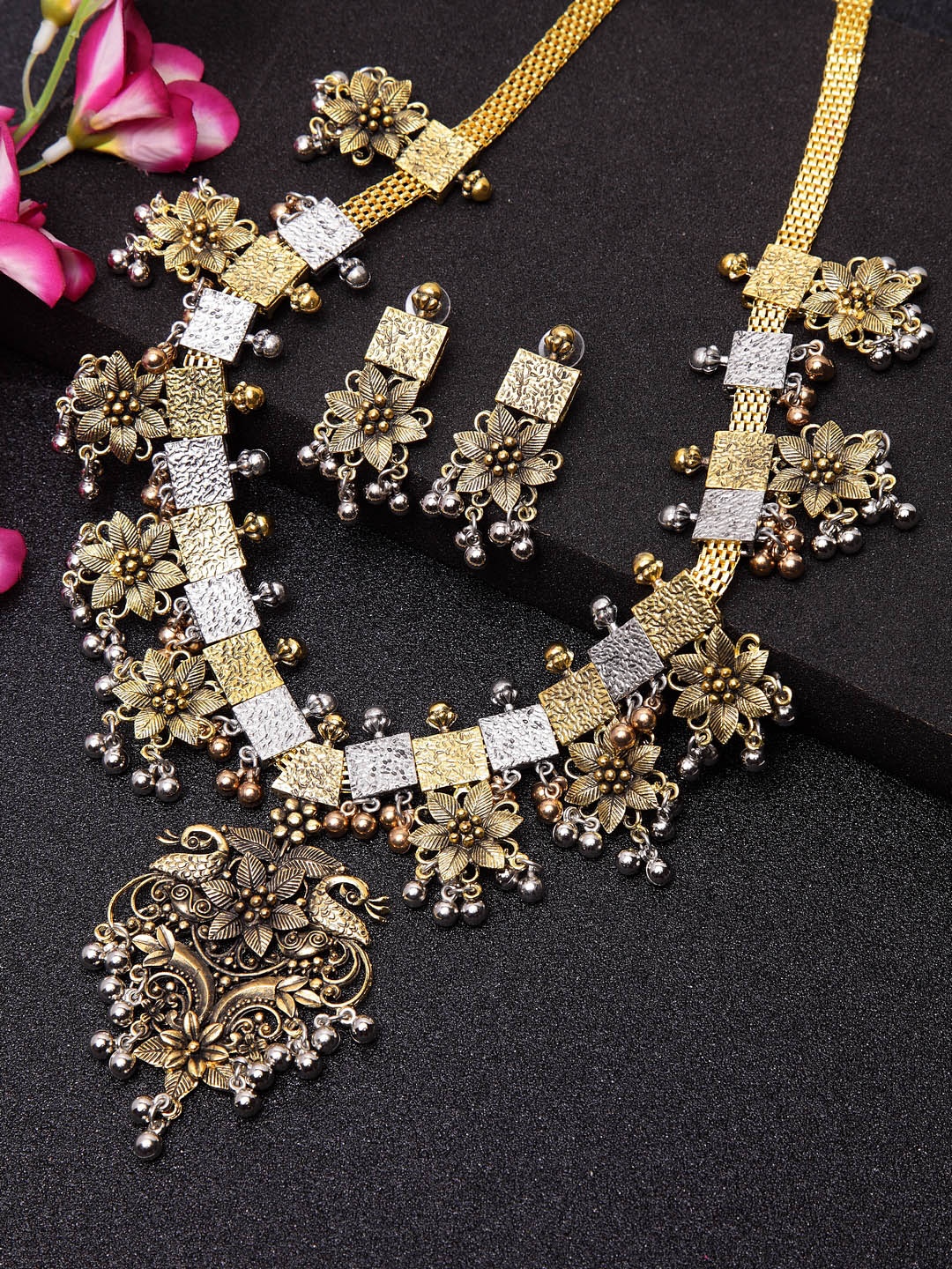 Moedbuille Gold-Plated Oxidized Silver-Toned Antique Floral Design Tribal Handcrafted Jewellery Set
Moedbuille Gold-Plated Oxidized Silver-Toned Antique Floral Design Tribal Handcrafted Jewellery Set