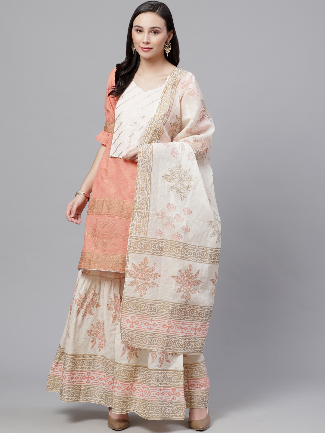 Chhabra 555 Women Peach-Coloured & Peach-Coloured Solid Kurta with Sharara & Dupatta
Chhabra 555 Women Peach-Coloured & Peach-Coloured Solid Kurta with Sharara & Dupatta
