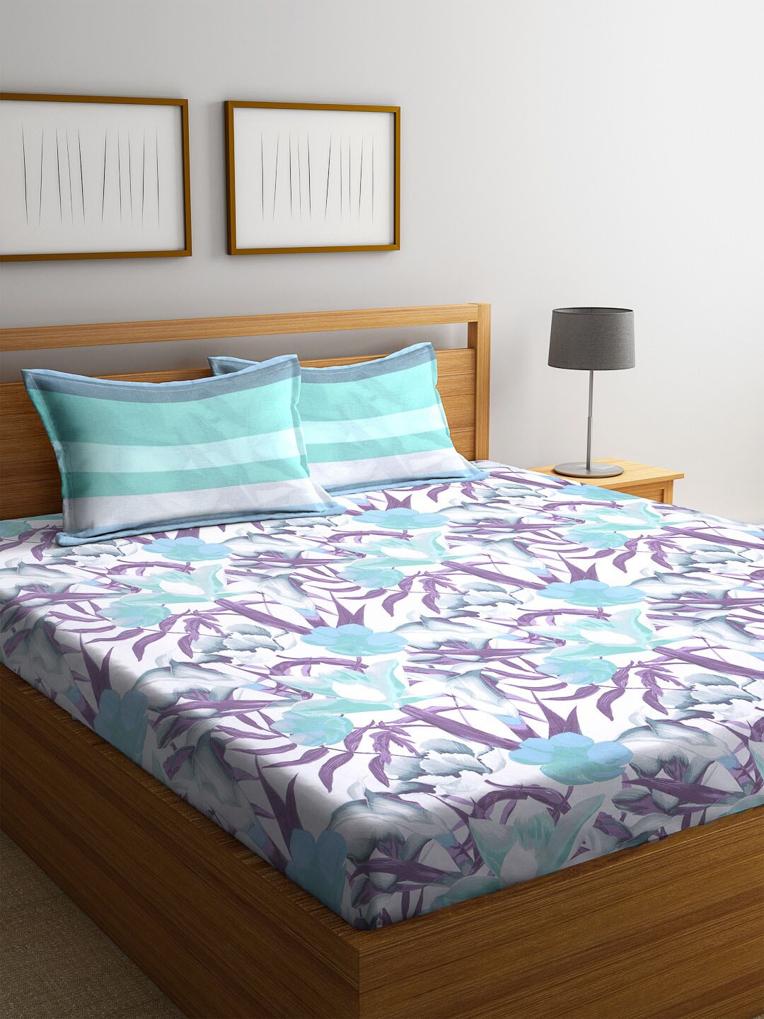 BOMBAY DYEING Blue & Purple Floral 104 TC Cotton 1 Queen Bedsheet with 2 Pillow Covers
BOMBAY DYEING Blue & Purple Floral 104 TC Cotton 1 Queen Bedsheet with 2 Pillow Covers