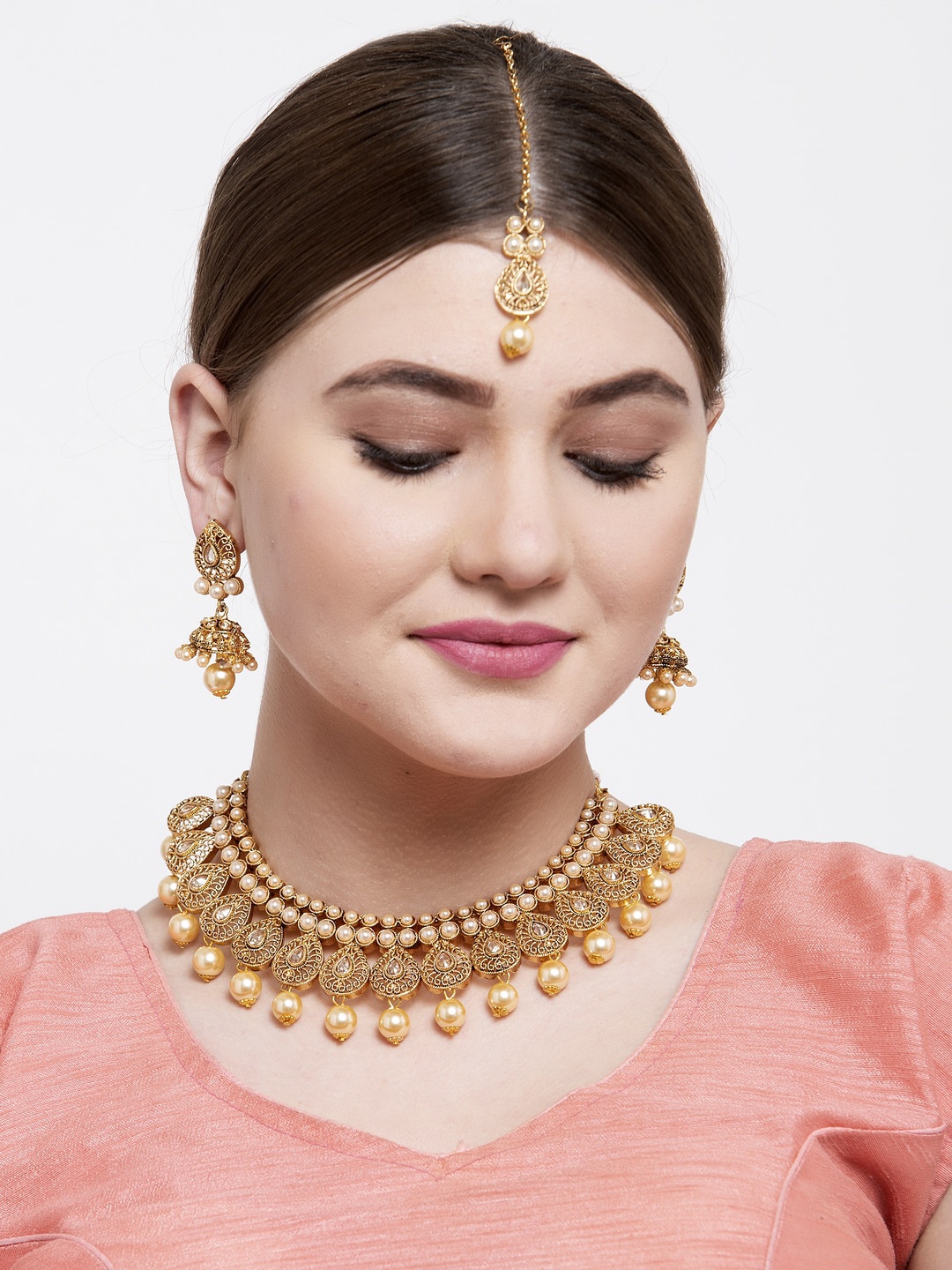 Shining Diva Gold-Plated Off-White & Beige Pearl & Stone-Studded Antique Jewellery Set
Shining Diva Gold-Plated Off-White & Beige Pearl & Stone-Studded Antique Jewellery Set