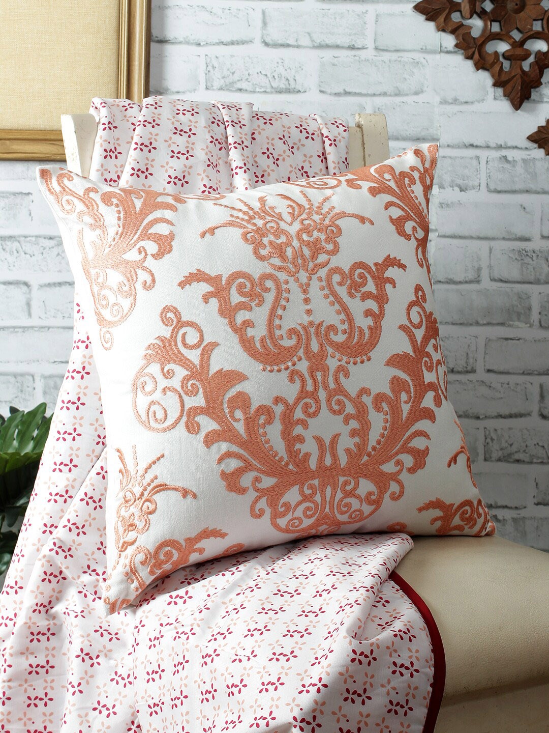 REME White & Orange Ethnic Motifs Embroidered Organic Cotton Square Cushion Cover
REME White & Orange Ethnic Motifs Embroidered Organic Cotton Square Cushion Cover