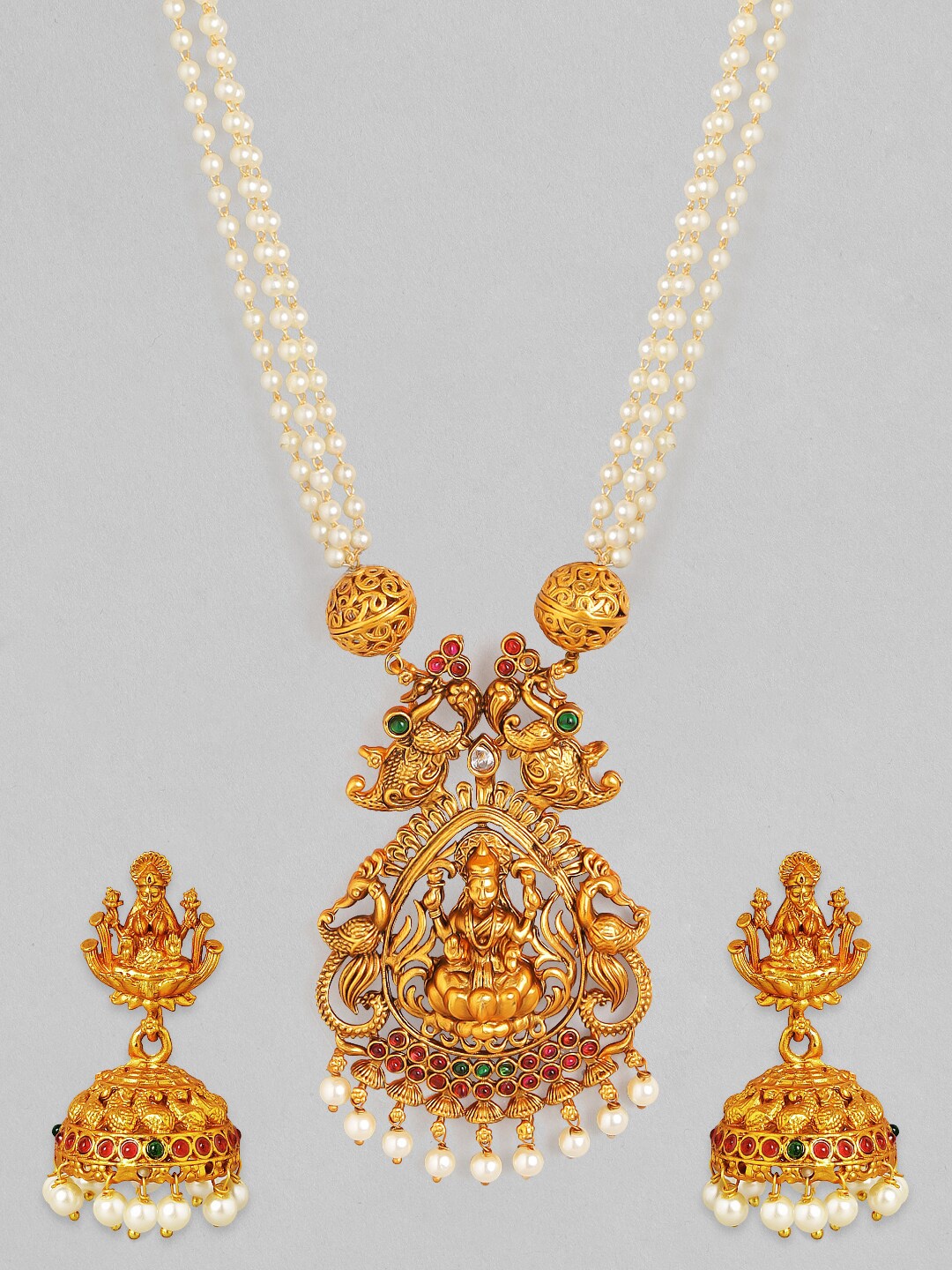Rubans 24K Gold-Plated White Beaded Handcrafted Ruby Stone Devine Lakshmi Design Jewellery Set
Rubans 24K Gold-Plated White Beaded Handcrafted Ruby Stone Devine Lakshmi Design Jewellery Set