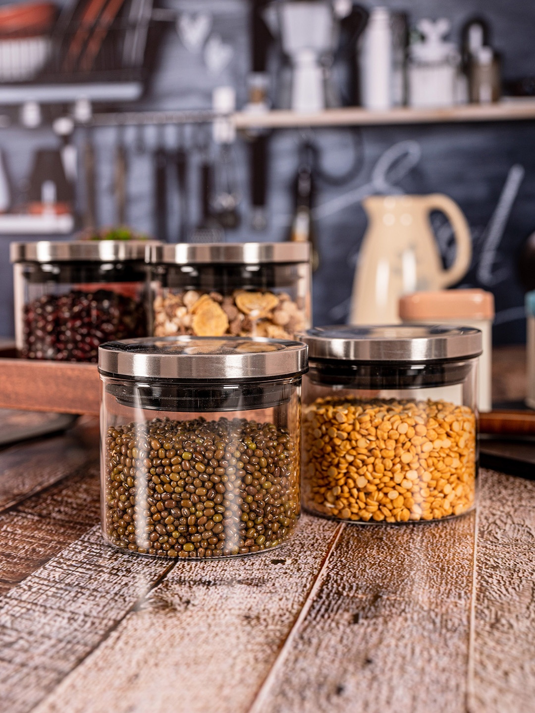 Roxx Set Of 4 Transparent & Silver-Toned Borosilicate Glass Containers With Lids 500 ML
Roxx Set Of 4 Transparent & Silver-Toned Borosilicate Glass Containers With Lids 500 ML