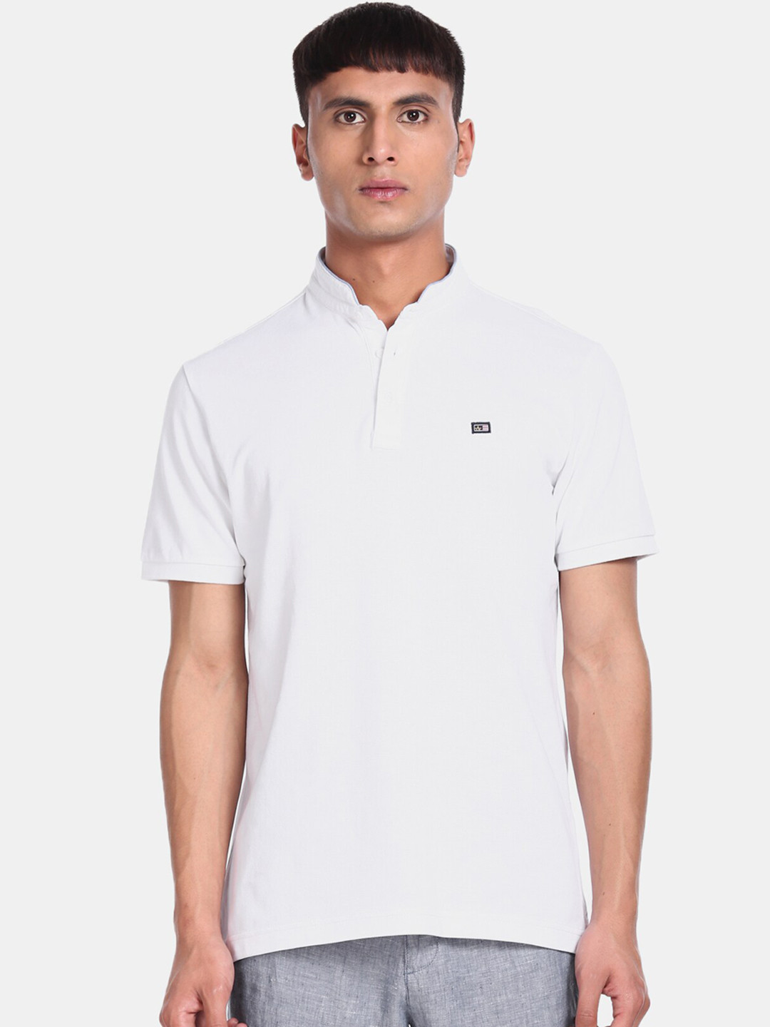 Arrow Sport Men White Solid Mandarin Collar T-shirt
Arrow Sport Men White Solid Mandarin Collar T-shirt