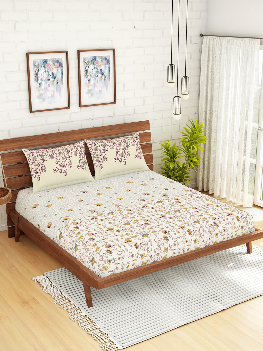 SPACES Cream-Coloured & Purple Ethnic Motifs 144 TC Cotton 1 King Bedsheet with 2 Pillow Covers
SPACES Cream-Coloured & Purple Ethnic Motifs 144 TC Cotton 1 King Bedsheet with 2 Pillow Covers
