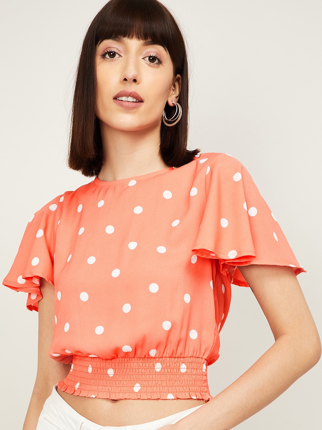 Ginger by Lifestyle Coral Orange & White Polka Dot Printed Flared Sleeves Blouson Top
Ginger by Lifestyle Coral Orange & White Polka Dot Printed Flared Sleeves Blouson Top