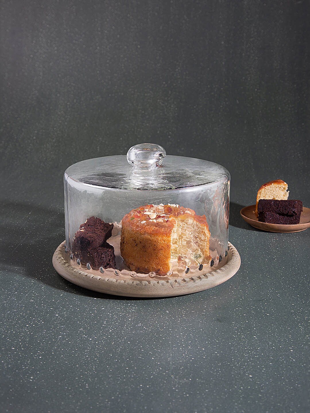 ellementry Transparent & Brown Solid Cylindrical Leaf Glass Cloche With Wooden Base Serveware
ellementry Transparent & Brown Solid Cylindrical Leaf Glass Cloche With Wooden Base Serveware