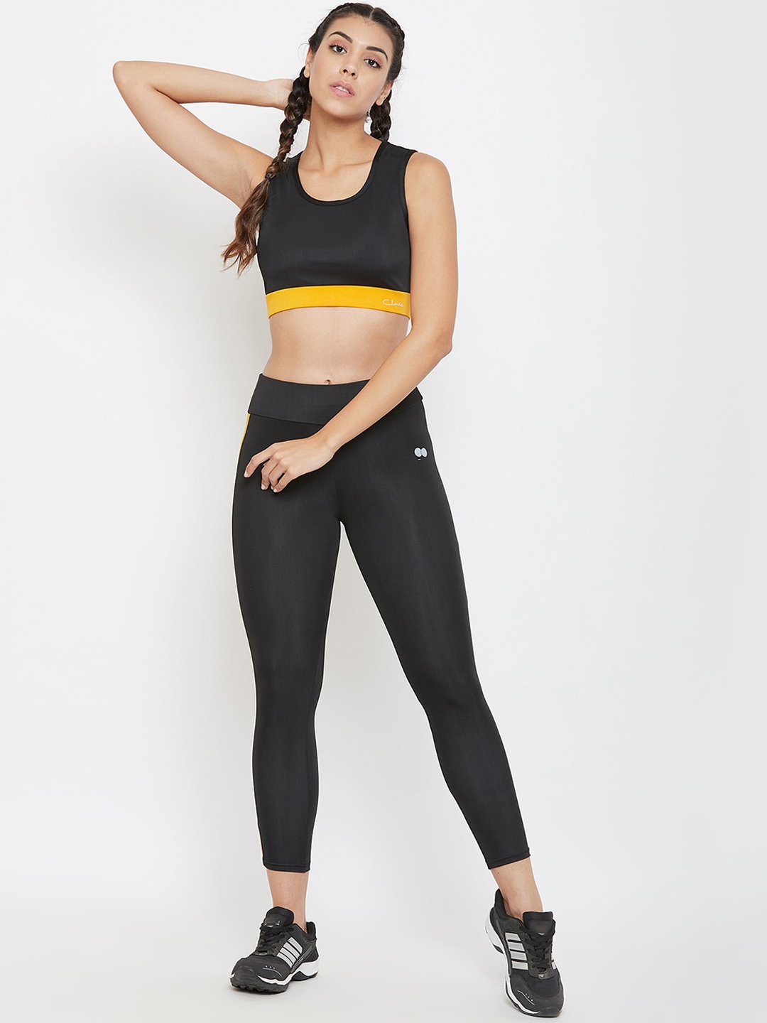 Clovia Women Black & Mustard Yellow Colourblocked Activewear Tights & Padded Sports Bra
Clovia Women Black & Mustard Yellow Colourblocked Activewear Tights & Padded Sports Bra