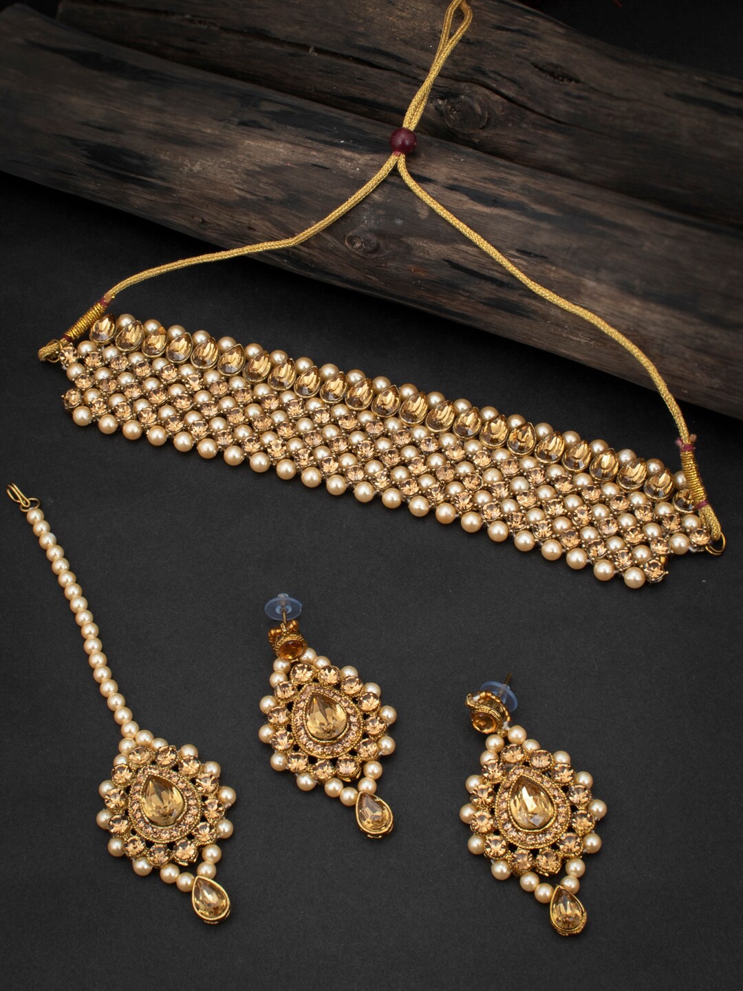 Sukkhi LCT Gold-Plated Beige & White Pearl & Stone-Studded Sustainable Jewellery Set
Sukkhi LCT Gold-Plated Beige & White Pearl & Stone-Studded Sustainable Jewellery Set