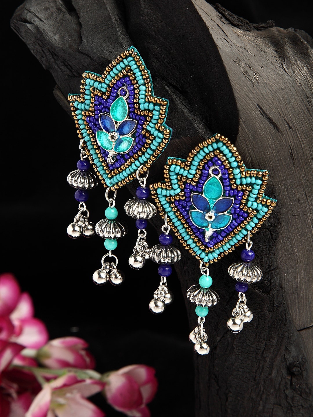 Moedbuille Turquoise Blue Beads Studded Oxidised Silver Plated Handcrafted Tasselled Earrings
Moedbuille Turquoise Blue Beads Studded Oxidised Silver Plated Handcrafted Tasselled Earrings