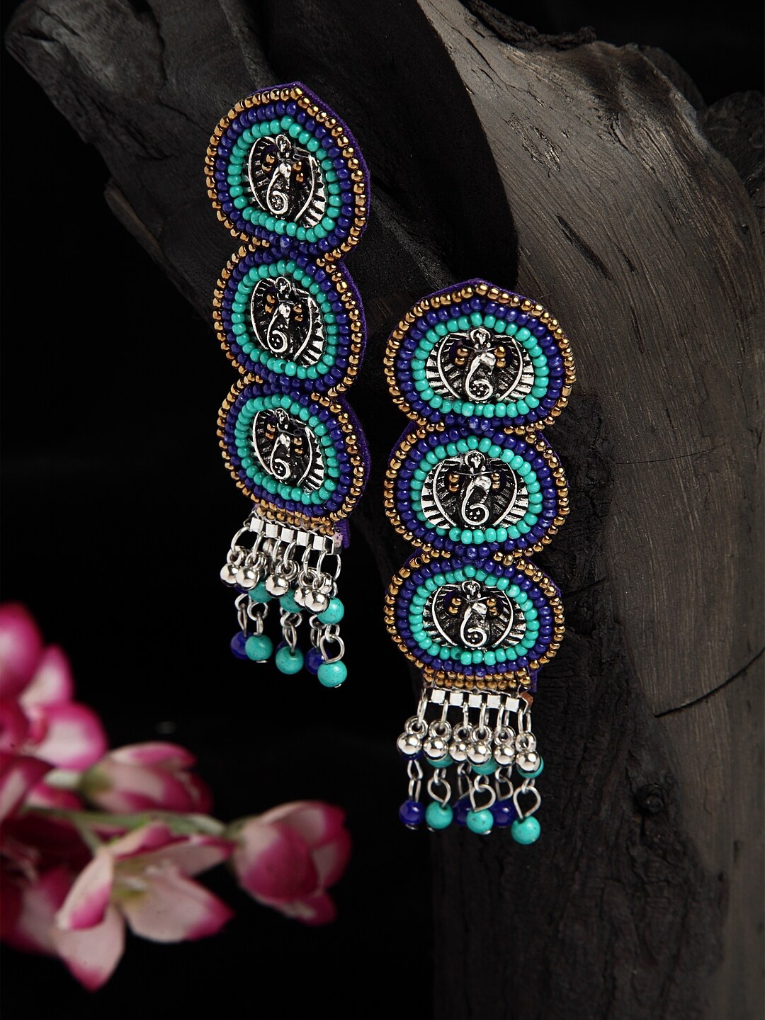 Moedbuille Turquoise Blue Beads Studded Oxidised Silver Plated Handcrafted Contemporary Earrings
Moedbuille Turquoise Blue Beads Studded Oxidised Silver Plated Handcrafted Contemporary Earrings