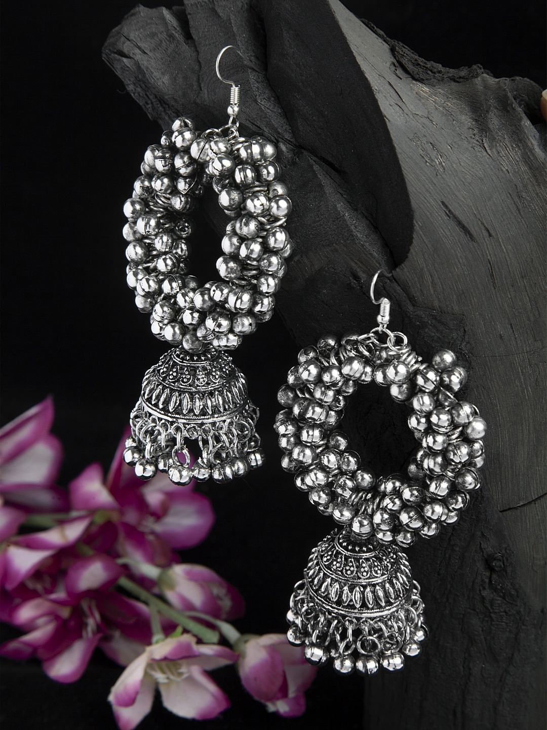 Handcrafted Ghungroo Studded Tribal Design Oxidised Silver Plated Handcrafted Jhumkas
Handcrafted Ghungroo Studded Tribal Design Oxidised Silver Plated Handcrafted Jhumkas