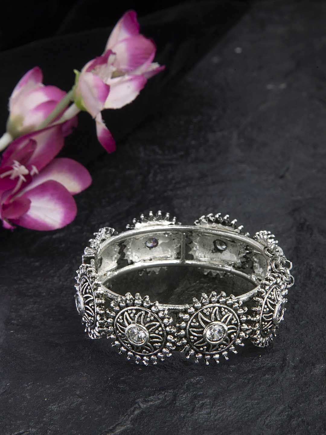 Moedbuille Stone Studded Filigree Work Oxidised Silver Plated Handcrafted Tribal Bracelet
Moedbuille Stone Studded Filigree Work Oxidised Silver Plated Handcrafted Tribal Bracelet