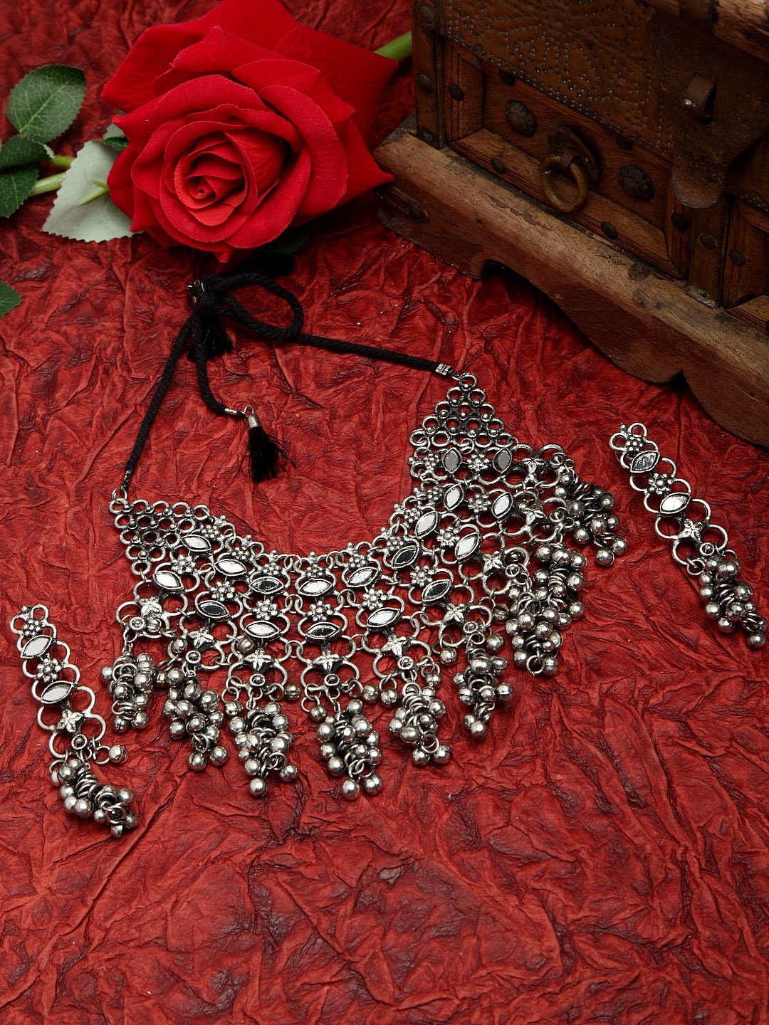 Moedbuille Mirrors and Ghungroo Studded Tasselled Design Oxidised Silver Plated Jewelry Set
Moedbuille Mirrors and Ghungroo Studded Tasselled Design Oxidised Silver Plated Jewelry Set