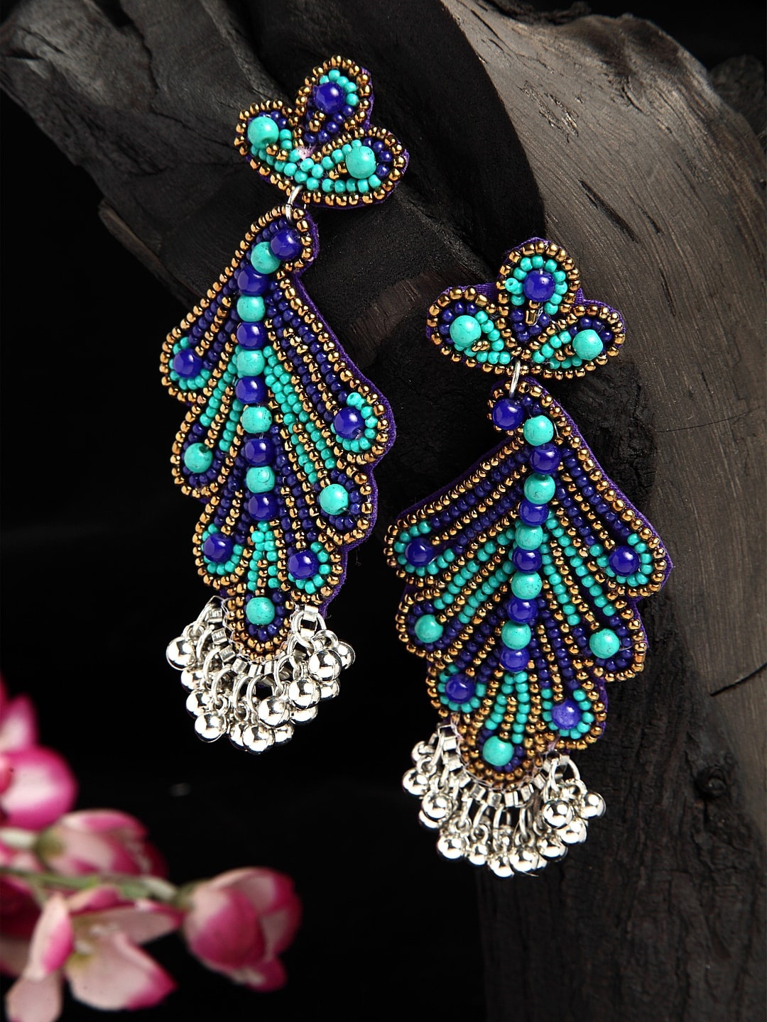 Moedbuille Turquoise Blue Beads Studded Oxidised Silver Plated Handcrafted Afghan Design Jhumkas
Moedbuille Turquoise Blue Beads Studded Oxidised Silver Plated Handcrafted Afghan Design Jhumkas