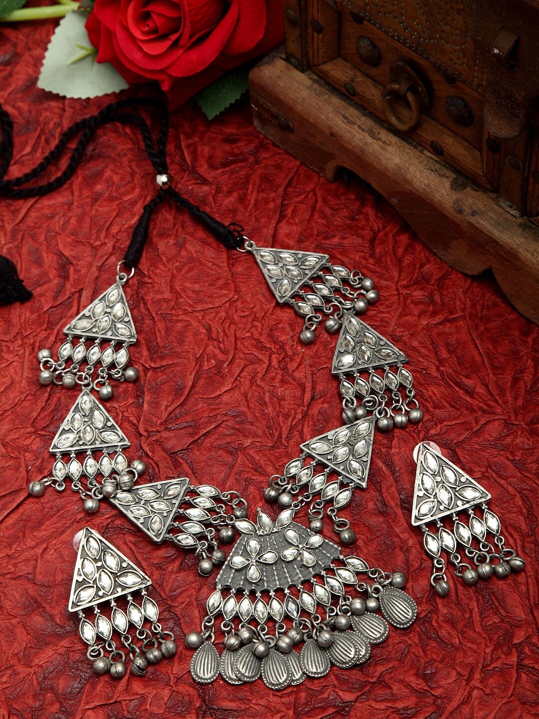 Moedbuille Mirrors and Beads Studded Oxidised Silver Plated Handcrafted Tasselled Jewelry Set
Moedbuille Mirrors and Beads Studded Oxidised Silver Plated Handcrafted Tasselled Jewelry Set