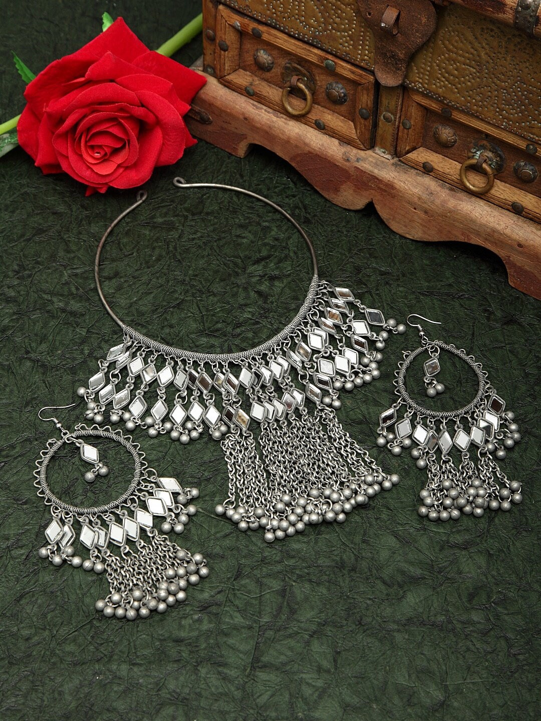 Moedbuille Mirror Studded Tasselled Design Oxidised Silver Plated Handcrafted Afghan Jewelry Set
Moedbuille Mirror Studded Tasselled Design Oxidised Silver Plated Handcrafted Afghan Jewelry Set