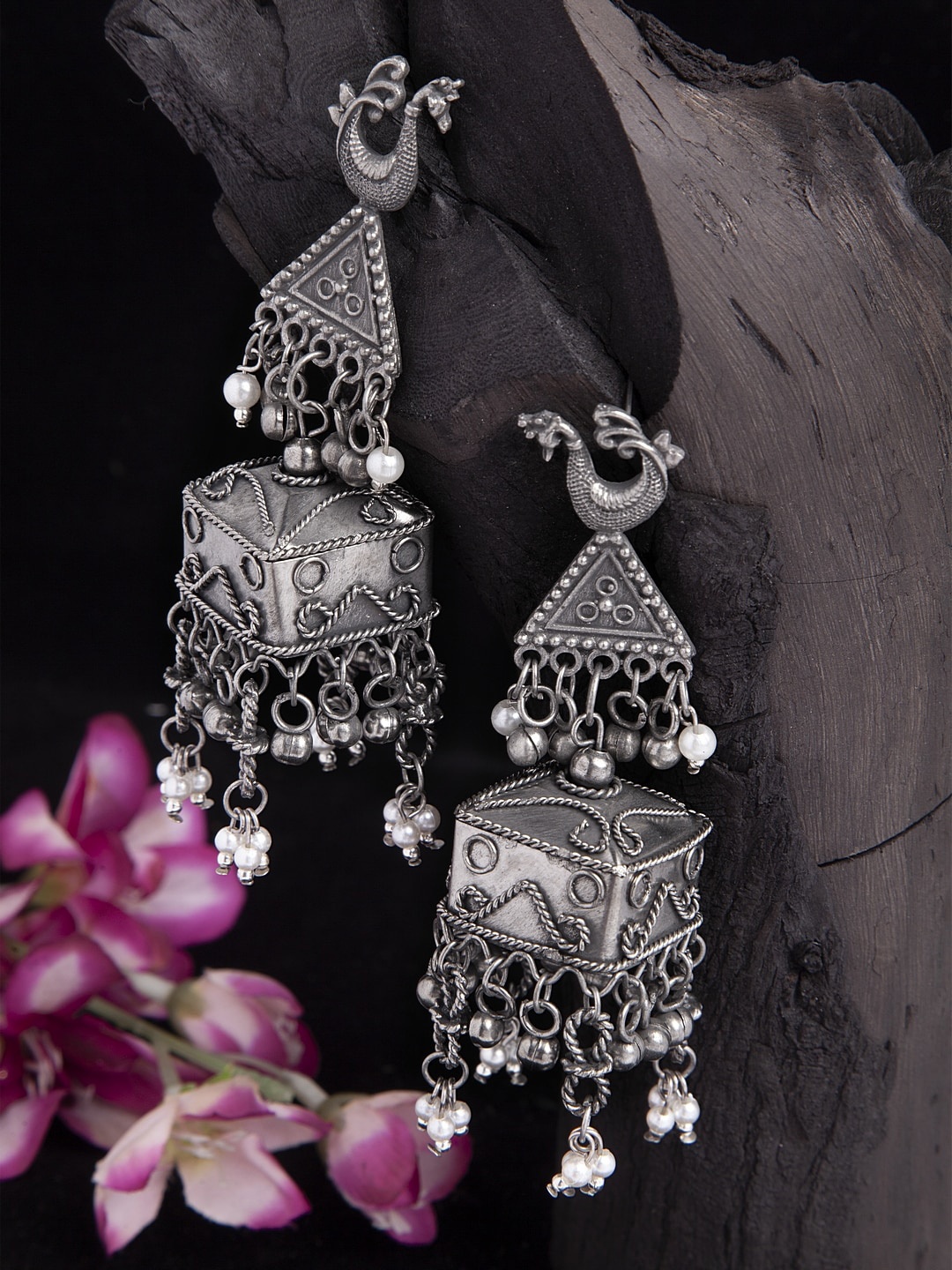 Moedbuille Peacock Shape Tribal Design Oxidised Silver Plated Handcrafted Chandelier Jhumkas
Moedbuille Peacock Shape Tribal Design Oxidised Silver Plated Handcrafted Chandelier Jhumkas