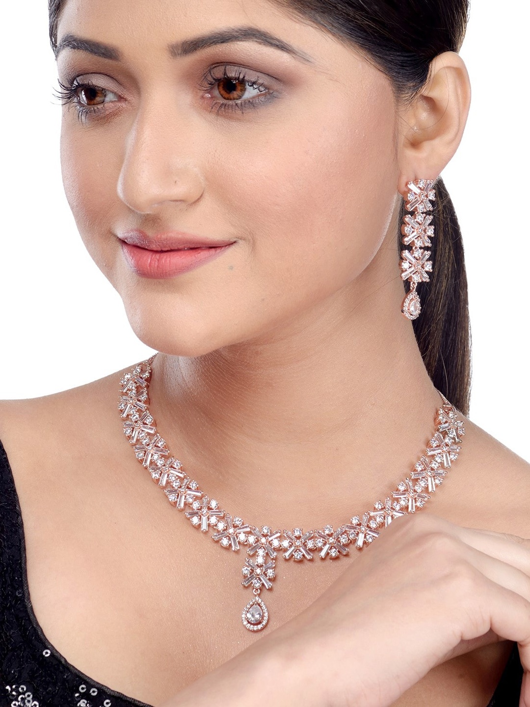 Saraf RS Jewellery Rose Gold-Plated American Diamond Studded Handcrafted Jewellery Set
Saraf RS Jewellery Rose Gold-Plated American Diamond Studded Handcrafted Jewellery Set