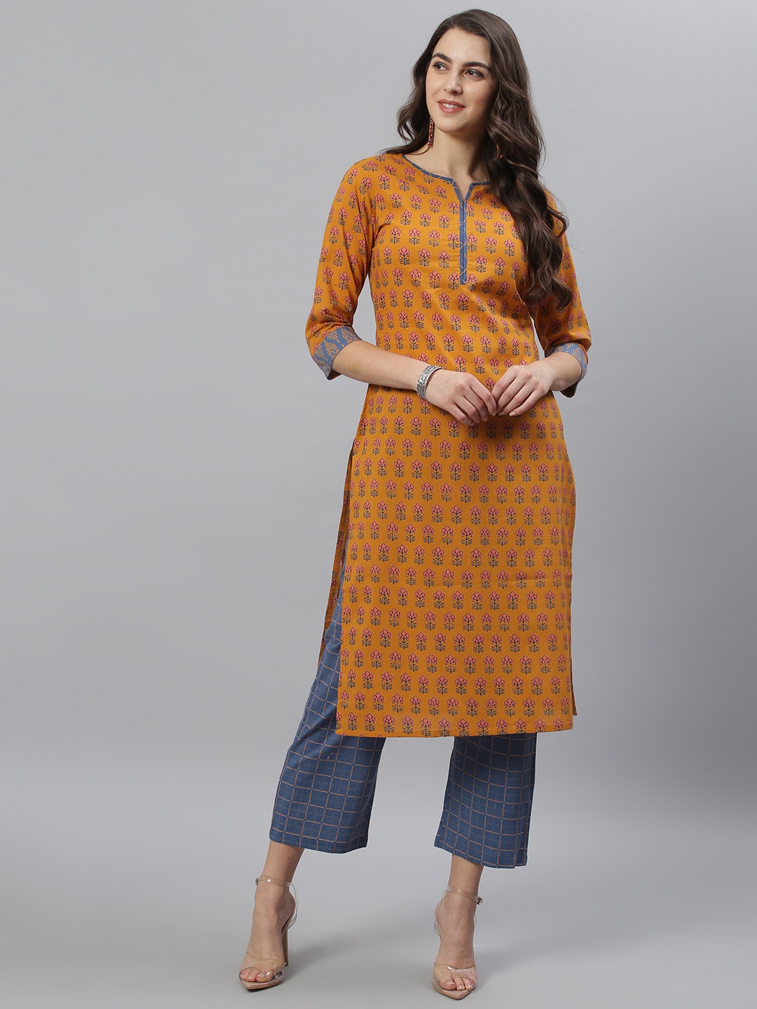 Azira Women Mustard Yellow & Navy Blue Pure Cotton Ethnic Motifs Print Kurta & Trousers
Azira Women Mustard Yellow & Navy Blue Pure Cotton Ethnic Motifs Print Kurta & Trousers