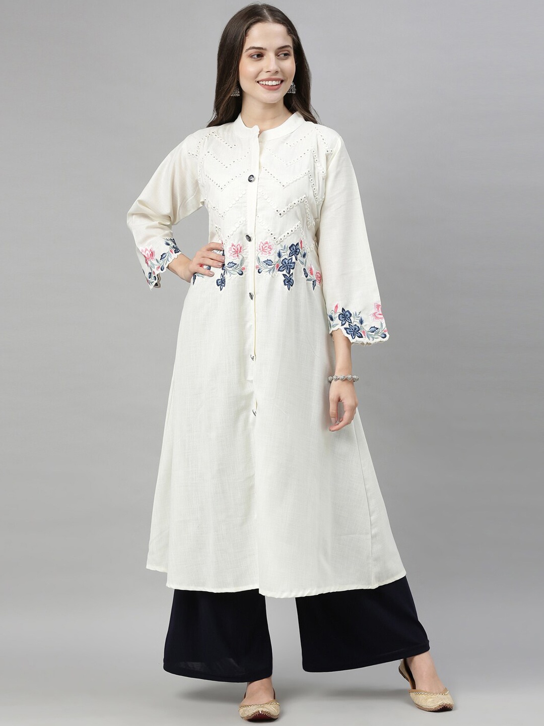 Neerus Women Off White Yoke Design Flared Sleeves Thread Work Pleated A-Line Cotton Kurta
Neerus Women Off White Yoke Design Flared Sleeves Thread Work Pleated A-Line Cotton Kurta