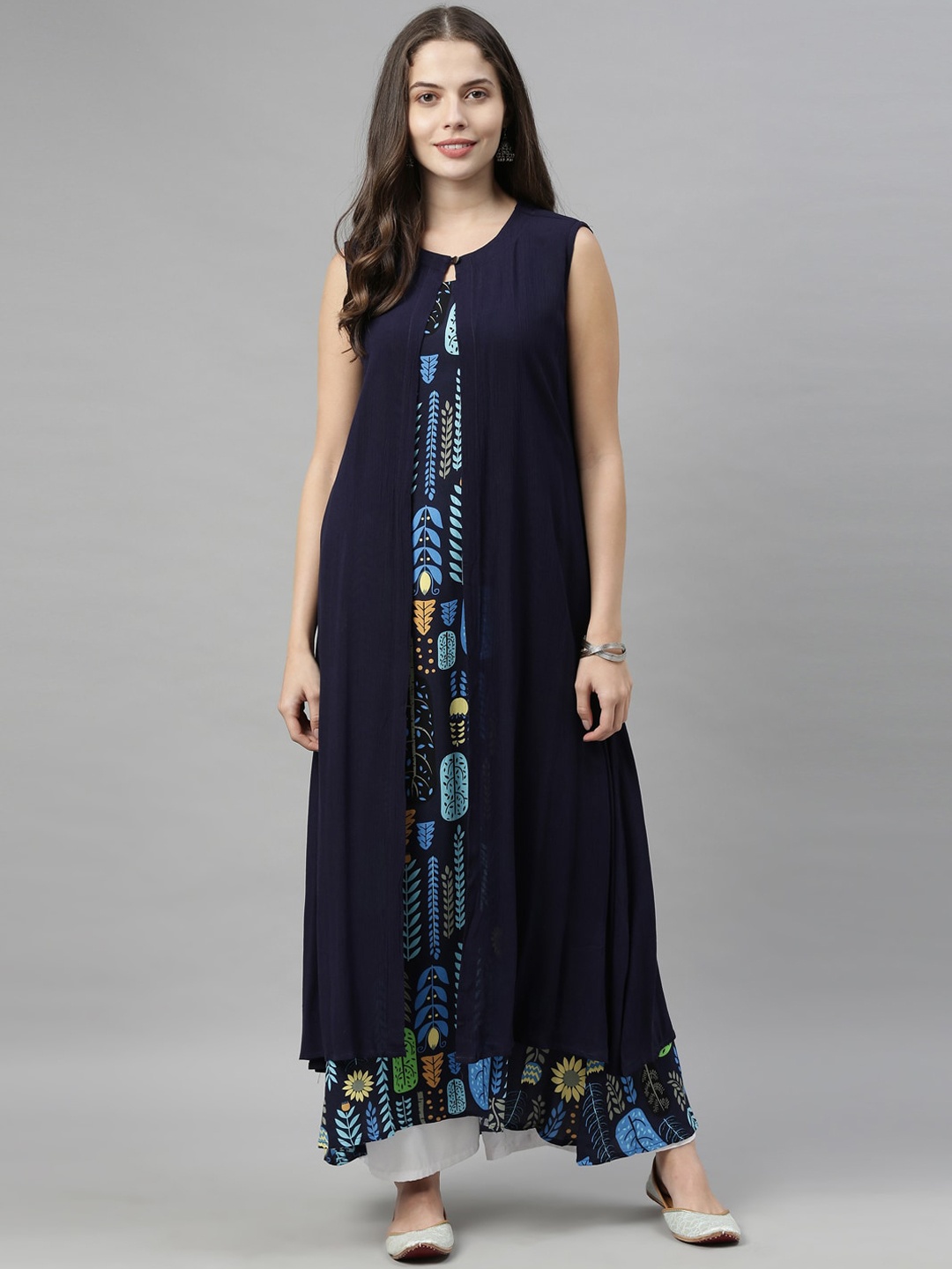 Neerus Women Navy Blue & Green Quirky Printed Quirky Print A-Line Kurta with Ethnic jacket
Neerus Women Navy Blue & Green Quirky Printed Quirky Print A-Line Kurta with Ethnic jacket