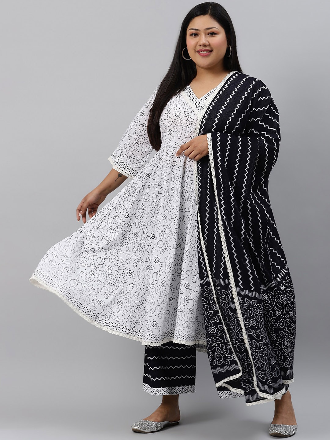 EXTRA LOVE BY LIBAS Women Plus Size White & Black Printed Kurta with Palazzos & Dupatta
EXTRA LOVE BY LIBAS Women Plus Size White & Black Printed Kurta with Palazzos & Dupatta