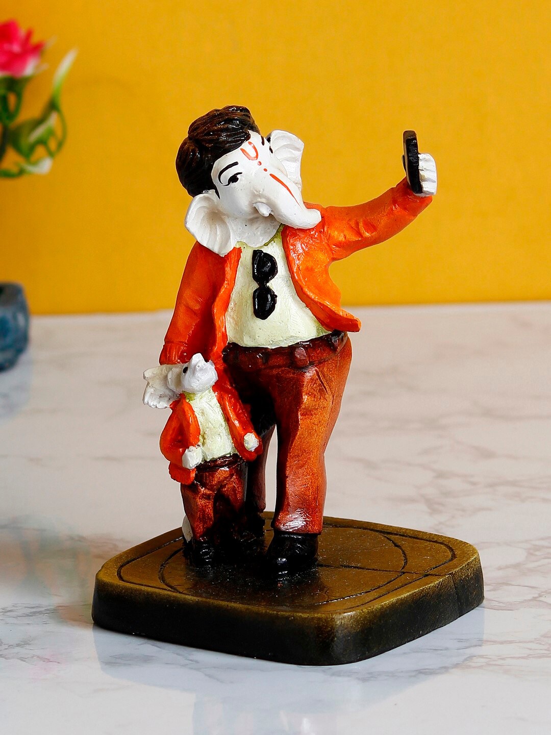 eCraftIndia Brown & Orange Lord Ganesha Taking Selfie With Mushak Handcrafted Showpiece
eCraftIndia Brown & Orange Lord Ganesha Taking Selfie With Mushak Handcrafted Showpiece