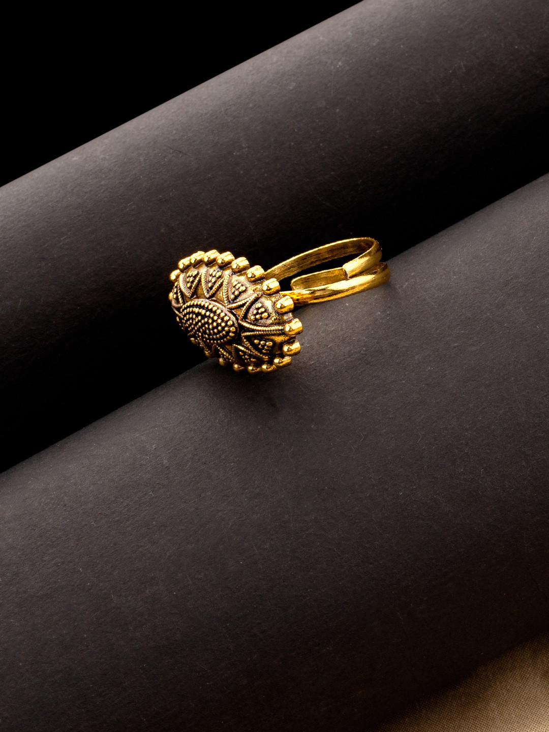 Voylla Antique Gold-Plated Rava Ball Trending Adjustable Finger Ring 
Voylla Antique Gold-Plated Rava Ball Trending Adjustable Finger Ring