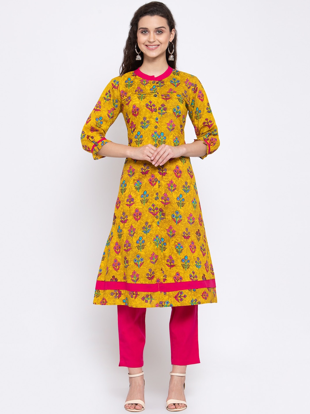 Indibelle Women Yellow & Pink Floral Printed Regular A-Line Pure Cotton Kurta & Trousers
Indibelle Women Yellow & Pink Floral Printed Regular A-Line Pure Cotton Kurta & Trousers