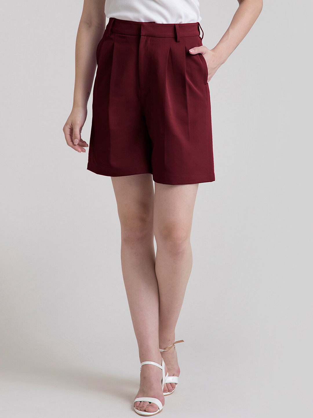 FableStreet Women Maroon Solid Loose Fit Regular Shorts 
FableStreet Women Maroon Solid Loose Fit Regular Shorts