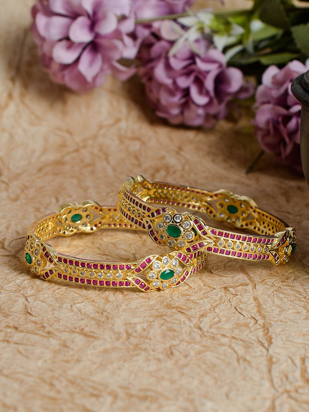 Silvermerc Designs Set Of 2 Gold-Plated Green & Red Jadau American Diamond-Studded Handcrafted Bangles
Silvermerc Designs Set Of 2 Gold-Plated Green & Red Jadau American Diamond-Studded Handcrafted Bangles