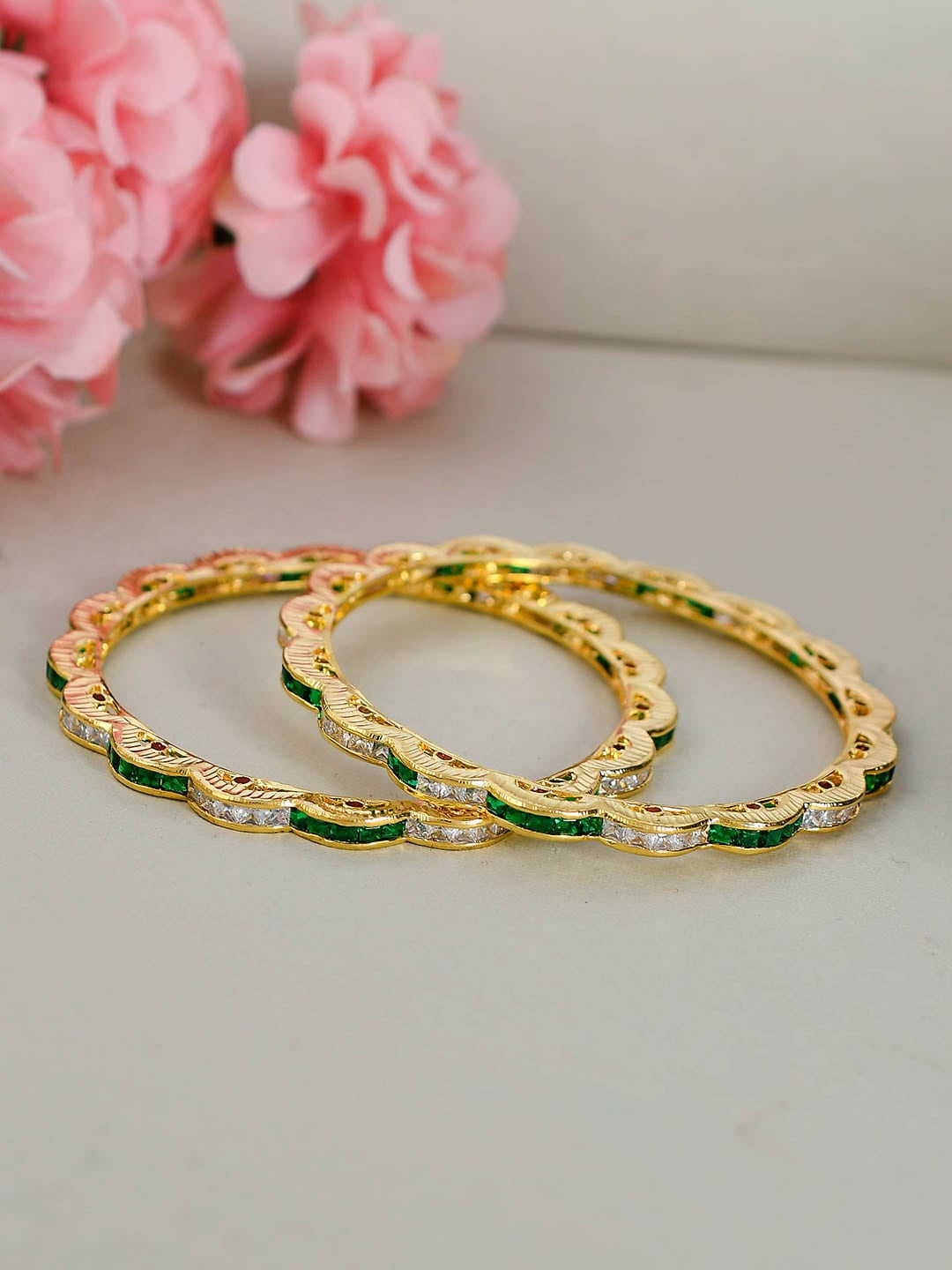 Silvermerc Designs Set Of 2 Gold-Plated Green & White AD Studded Handcrafted Bridal Gokhroo Bangles
Silvermerc Designs Set Of 2 Gold-Plated Green & White AD Studded Handcrafted Bridal Gokhroo Bangles
