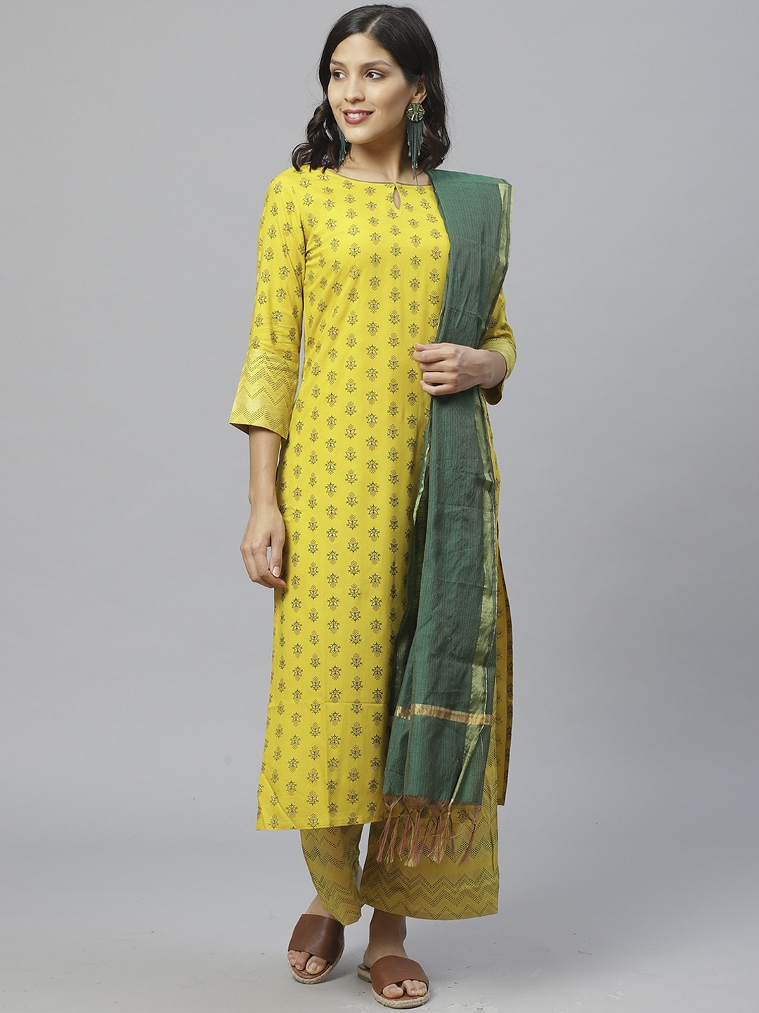 Indo Era Women Yellow Ethnic Motifs Printed Regular Straight Keyhole Neck Foil Kurta Set
Indo Era Women Yellow Ethnic Motifs Printed Regular Straight Keyhole Neck Foil Kurta Set