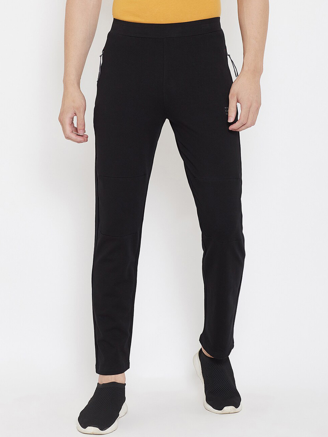 Okane Men Black Solid Track Pants
Okane Men Black Solid Track Pants