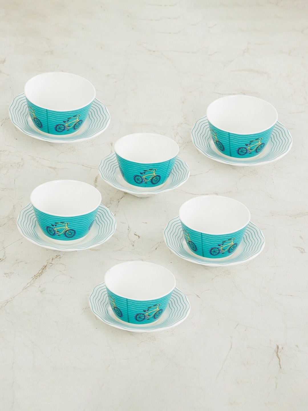 Home Centre Teal Blue & White 6 Pcs Raisa Lisbon Printed Bone China Cups and Saucer Set
Home Centre Teal Blue & White 6 Pcs Raisa Lisbon Printed Bone China Cups and Saucer Set