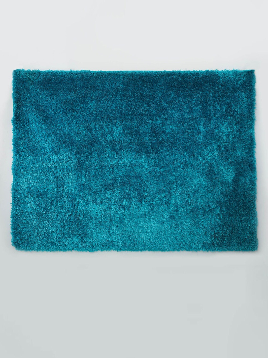 Home Centre Teal Blue Solid Eyelash Serena Rectangular Anti-Skid Shaggy Carpet
