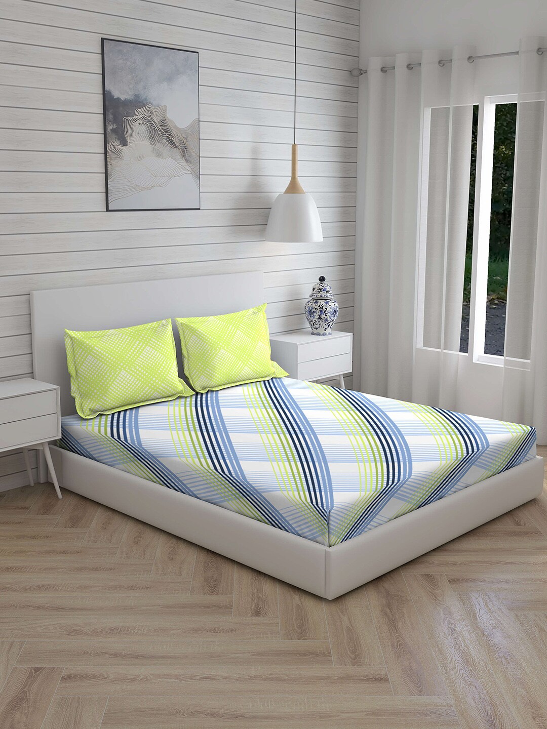 Layers Lime Green & White Striped 104 TC Cotton 1 Queen Bedsheet with 2 Pillow Covers
Layers Lime Green & White Striped 104 TC Cotton 1 Queen Bedsheet with 2 Pillow Covers