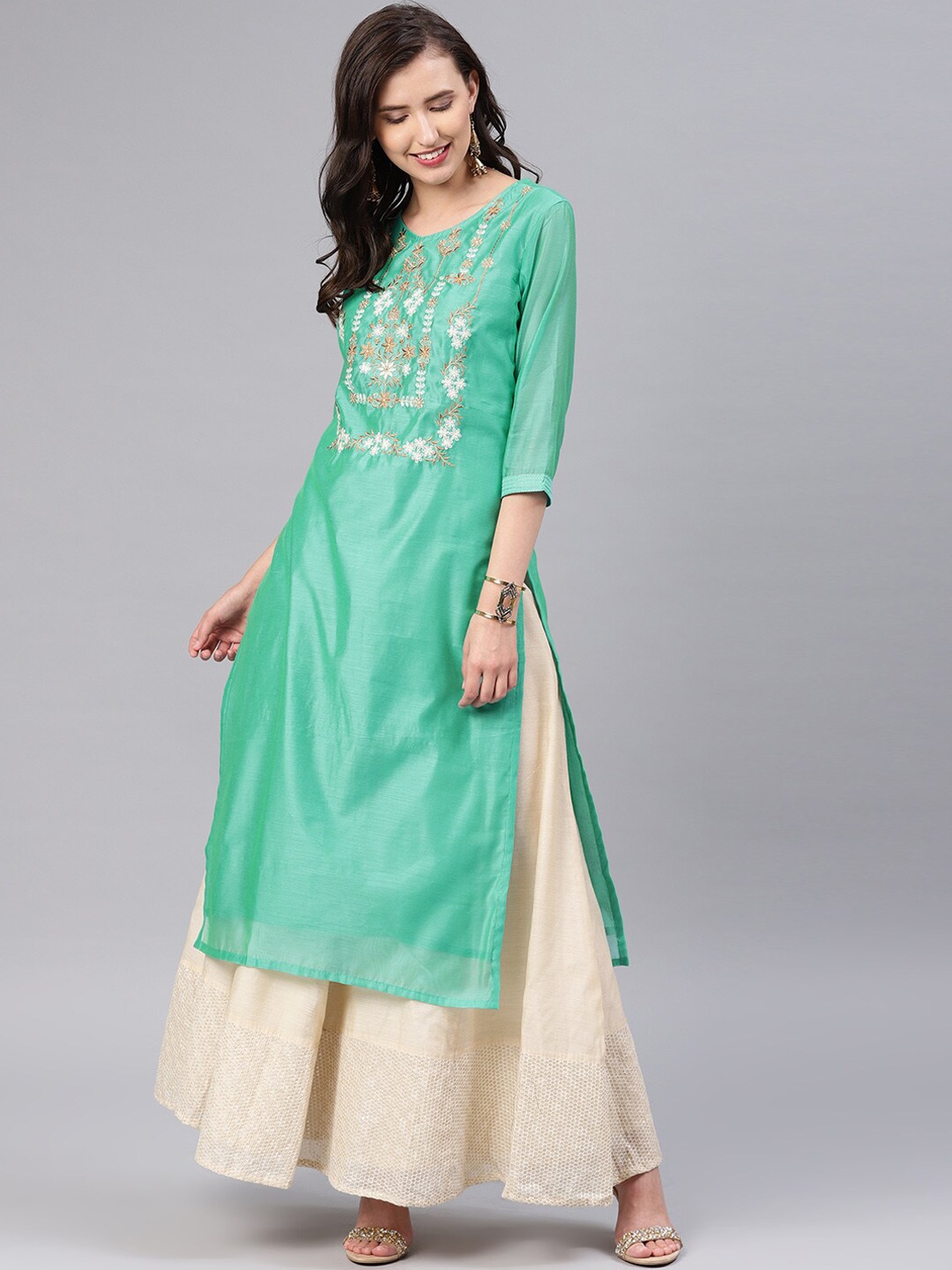 Alena Women Green & Off White Ethnic Motifs Yoke Design Thread Work Chanderi Silk Kurta
Alena Women Green & Off White Ethnic Motifs Yoke Design Thread Work Chanderi Silk Kurta