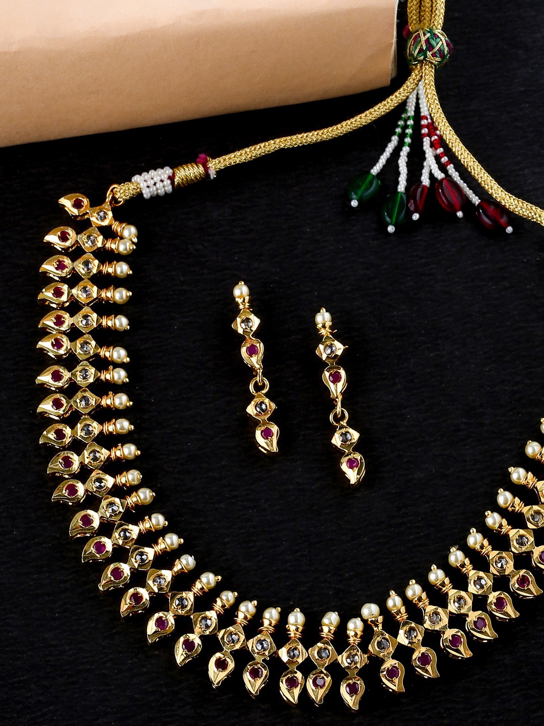 THE AAB STUDIO Gold-Plated Red & White Stone-Studded & Beaded Handcrafted Jewellery Set
THE AAB STUDIO Gold-Plated Red & White Stone-Studded & Beaded Handcrafted Jewellery Set