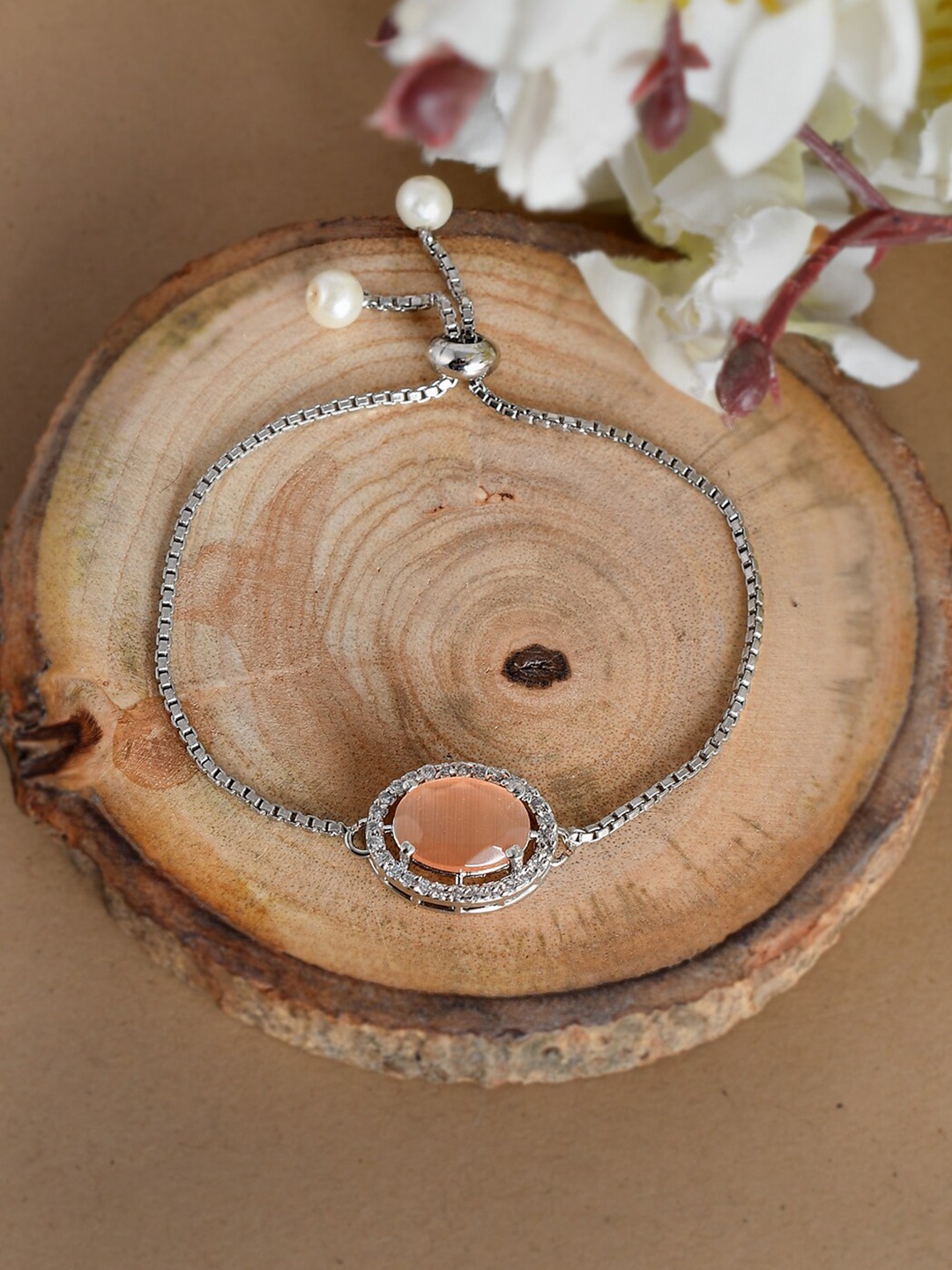 Silvermerc Designs Women Silver & Peach-Coloured Brass American Diamond Zodiac Bracelet
Silvermerc Designs Women Silver & Peach-Coloured Brass American Diamond Zodiac Bracelet