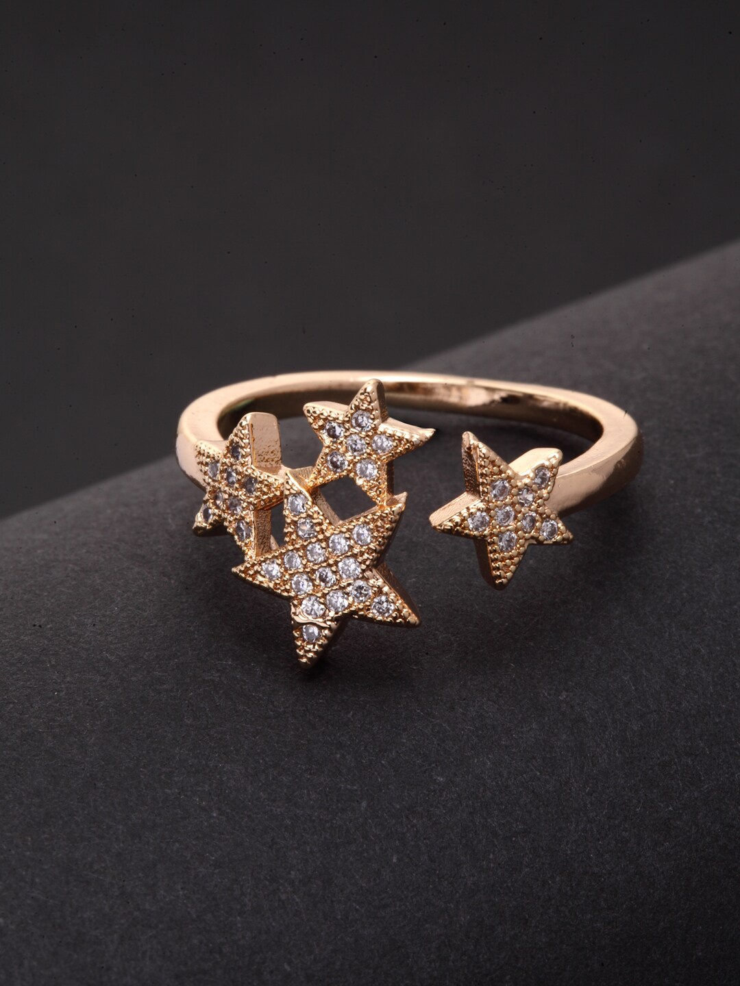VOGUE PANASH Gold-Plated White Cubic-Zirconia-Studded Star Shaped Adjustable Finger Ring
VOGUE PANASH Gold-Plated White Cubic-Zirconia-Studded Star Shaped Adjustable Finger Ring